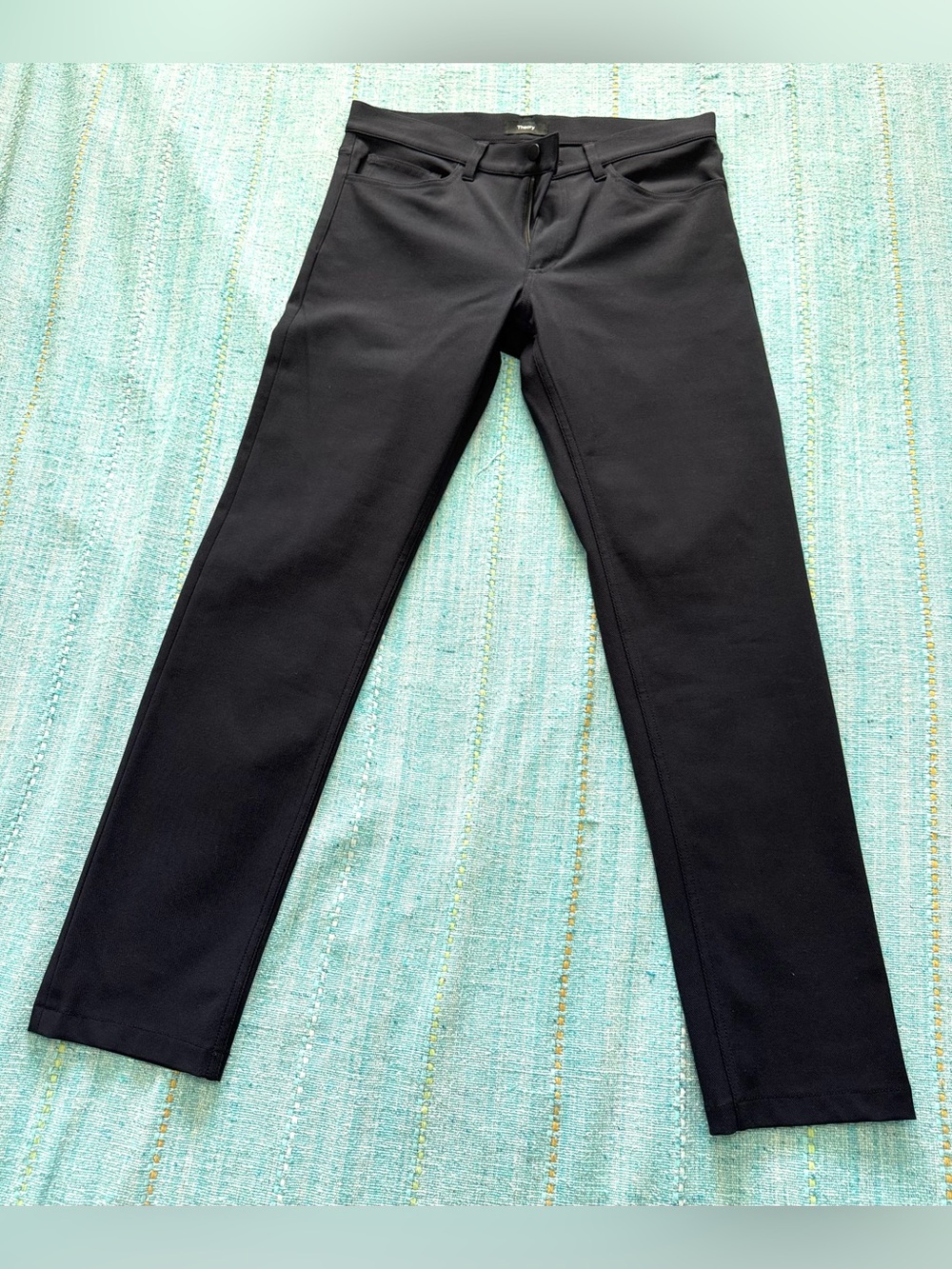 Theory Men's Dark Navy Stretch Chinos .
Also available in black .
